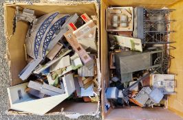 Two boxes of various model railway layout accessories to include tanks, signals, sheds etc.