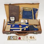 Masonic leather case containing various masonic items including four hallmarked silver and enamel