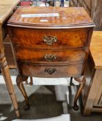 Early 20th century walnut and burr walnut bowfronted bedside chest of three drawers in the Queen