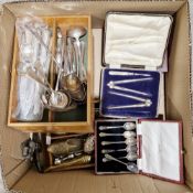 Silver plated cocktail shaker, a silver plated two-handled tray of oval form with pierced gallery, a