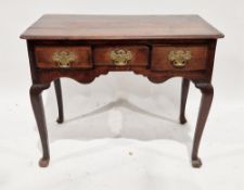 George III oak side table, the rectangular top with rounded corners and thumb moulded edge, the