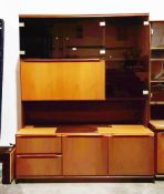Mid-century retro teak wall lounge unit by Morris of Glasgow, the upper section with three brown