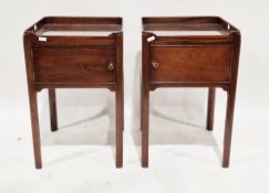 Pair of George III style mahogany square night stands, the galleried tops with pierced handles