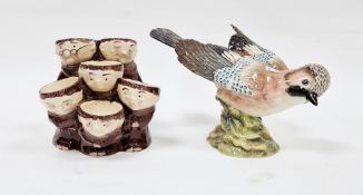Beswick pottery model of a jay, marked to base 1219, 25cm wide and a pottery novelty egg stand in