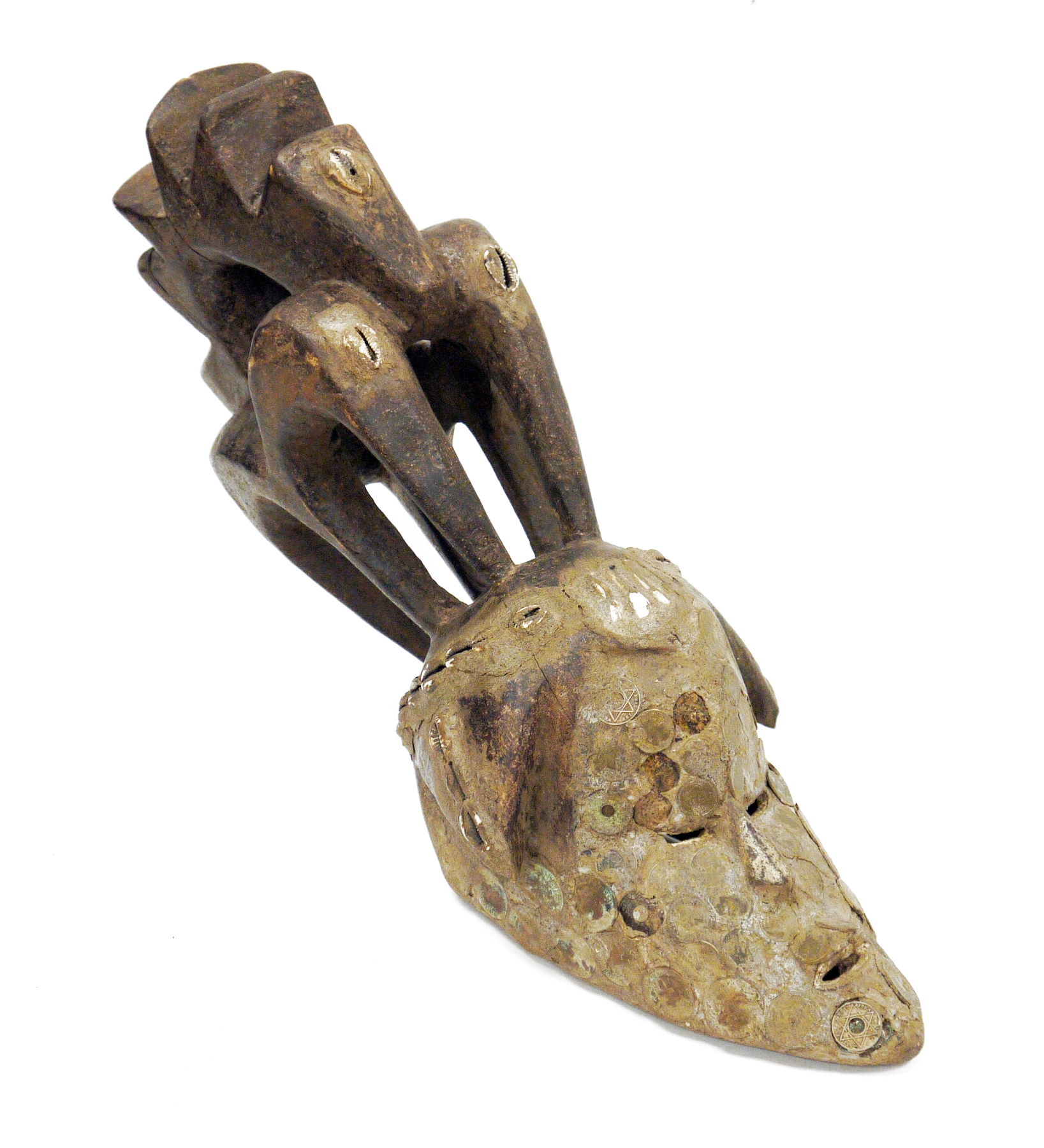 African tribal wooden face mask with integrated carved head piece, possibly Igbo, the long elongated