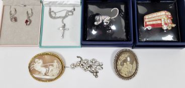 19th century gilt metal shell cameo brooch of oval form, the shell carved with the goddess Diana