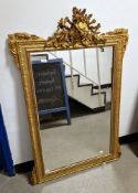 19th century giltwood and gesso framed rectangular overmantel mirror with an elaborately carved