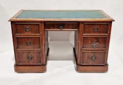 19th century mahogany twin-pedestal desk, the leatherette inset top with thumbmoulded edge over an