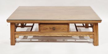 Modern elm coffee table in the Chinese manner, the rectangular top with glass cover over a single