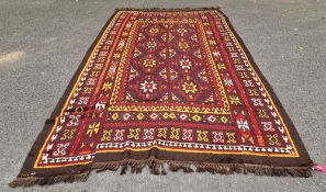 Uzbek Julkrys Nomadic tribal sleeping burgundy ground carpet with two rows of four geometric