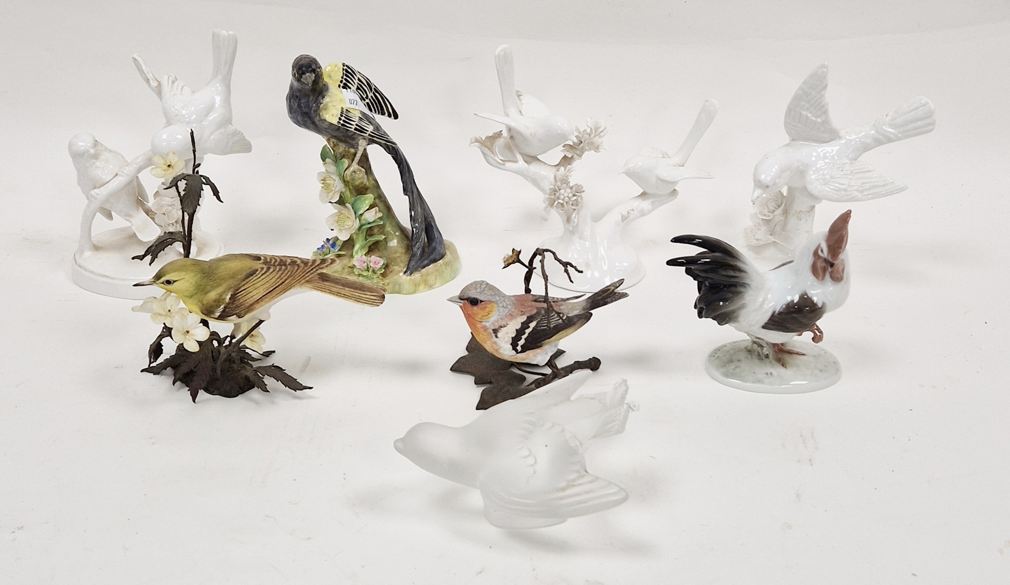 Staffordshire china white bird modelled by J T Jones and two others similar, Worcestershire