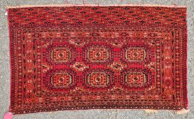 Tekke Turkoman chuval with six salor guls in orange, navy, salmon and cream geometric borders, 140cm