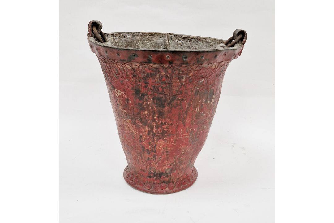 Antique red leather and metal-bound fire bucket with leather handle and studwork, 30cm high