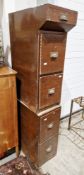 Pair of early 20th century cabinets, each with two deep drawers with brass cup handles, one