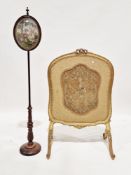 Early 20th century giltwood firescreen in the French manner with carved ribbon detail to top,