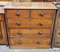 Victorian oak chest of two short over three long graduating drawers, the top with thumbnail
