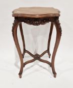 Early 20th century French mahogany side table, the quarter veneered shaped squared top with ogee