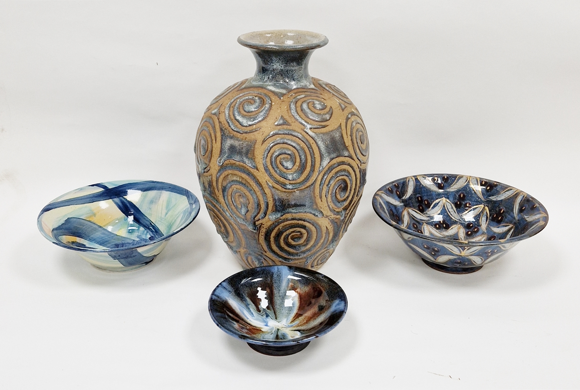 Robert Goldsmith bowl with blue ground, white, gold and black decoration, two other studio ceramic