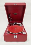 Mid 20th century 'Columbia' red cased portable clockwork gramophone with carrying handle to side,