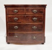 Victorian mahogany bowfronted chest of two short over three long graduating drawers, with rounded