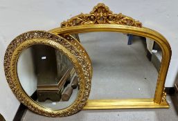 Gilt framed domed top overmantel mirror in the 19th century style, with shell and foliate scroll