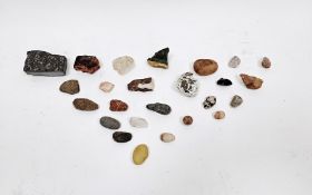 Collection of gemstone rocks and other aggregates including quartz and agate together with fossils