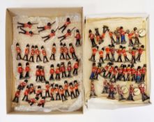 39 Britain's and other cast Soldier figures of guards including marching, kneeling and lying