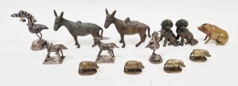 Collection of model animals including four South East Asian white metal animals, a cast brass