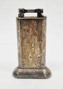 Early 20th century Dunhill silver plated table lighter with engine-turned decoration, 10cm high