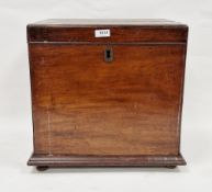 19th century mahogany cellarette, the hinged lid opening to six bottle spaces, drop ring handles