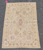 Cream and green ground Aubusson style rug in floral design, 117cm x 177cm  Property of Dunkirk