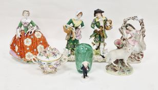 Continental porcelain figure of lady in crinoline dress holding dog, gold anchor mark, pair