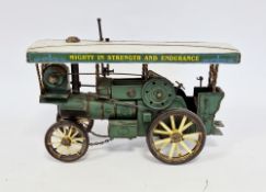 Tinplate model of a green traction engine ' Mighty in strength and endurance ', 31cm long standing