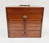 Late 19th mahogany apothecary or dentist's cabinet, the hinged lid with carrying handle opening to a