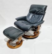 Norwegian Ekornes green leather Stressless lounge chair and matching footstool, both raised on