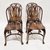 Set of four elm seated hoop and stickback dining chairs with front cabriole legs and crinoline