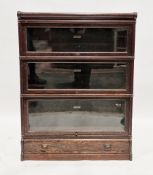 Early 20th century oak Globe Wernicke three-section bookcase, each section with lift-up glazed