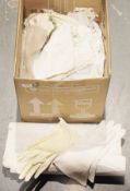 A fur and leather coat, a small quantity of white linen and other assorted vintage clothing (2