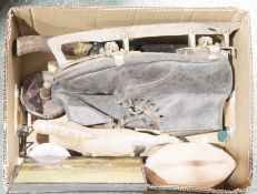 Pair of vintage ice skating boots, assorted carved wooden items to include a model of a horse, three