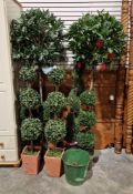 Quantity of large faux plants, some contained within ceramic pots to include two bay trees and six