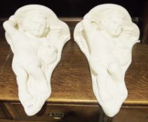 Pair of plaster wall shelves in the form of cherubs (2)