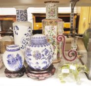 A Japanese Satsuma style narrow form vase bearing a scene of a noble lady in grounds, Italian