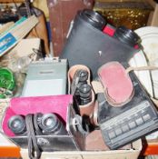 Pair of Perl 10x40 binoculars contained within a leather carrying case, a pair of Lieberman &