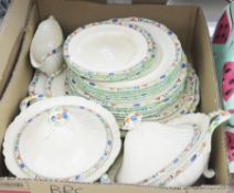 A Masons part dinner service in cream and brown with colourful chequered and floral border, to