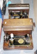 A collection of four assorted Singer sewing machines, including: model no. Y9304850, V1308328, the