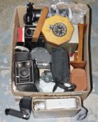 6-20 'Brownie D' by Kodak camera, a Zeiss Ikon Mettar camera, a Praktica PL Noval camera, a small
