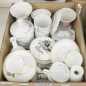 A Royal Worcester Columbine cup and saucer and a similar convolvulus cup and saucer, a small