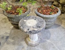 Pair of large composite stone jardinieres with banded and bow and ribbon decoration and a two-part