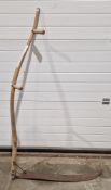 Large scythe with bent handles and two grips