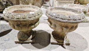 Pair of fluted urn-shaped jardinieres on stands (2)